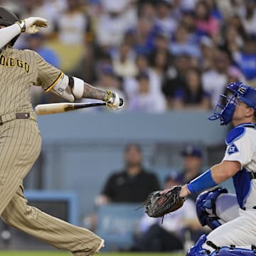 Jun 16, 2025; Los Angeles, California, USA; San Diego Padres third baseman Manny Machado (13) pops out during the third inning against the Los Angeles Dodgers at Dodger Stadium. Mandatory Credit: Jayne Kamin-Oncea-Imagn Images