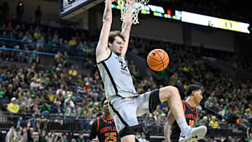 Jan 5, 2025; Eugene, Oregon, USA; Oregon Ducks center Nate Bittle (32) dunks the ball during the second half against the Maryland Terrapins at Matthew Knight Arena.