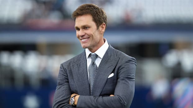 tom-brady-suit-arms-crossed