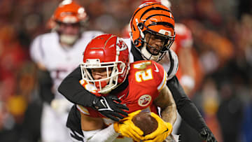 Jan 29, 2023; Kansas City, Missouri, USA; Kansas City Chiefs wide receiver Skyy Moore (24) runs with the ball against Cincinnati Bengals cornerback Eli Apple (20) during the fourth quarter of the AFC Championship game at GEHA Field at Arrowhead Stadium. Mandatory Credit: Jay Biggerstaff-Imagn Images