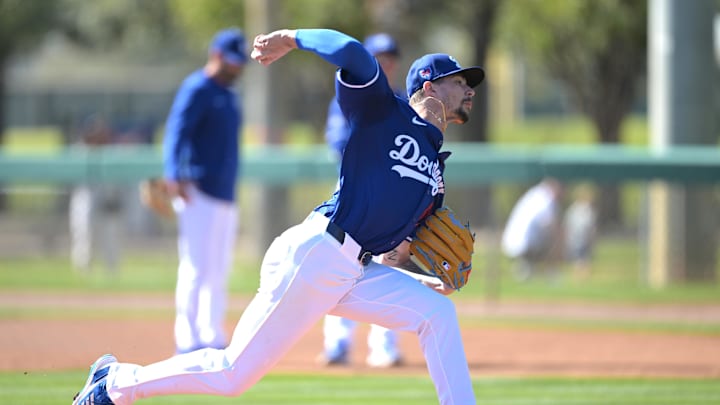 Feb 18, 2024; Glendale, AZ, USA;  Los Angeles Dodgers relief pitcher Ricky Vanasco (61) throws batting practice at spring training at Camelback Ranch. Mandatory Credit: Jayne Kamin-Oncea-Imagn Images