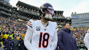 Jan 5, 2025; Green Bay, Wisconsin, USA;  Chicago Bears quarterback Caleb Williams (18) prior to the game against the Green Bay Packers at Lambeau Field. Mandatory Credit: Jeff Hanisch-Imagn Images