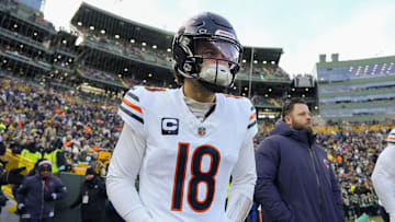 Jan 5, 2025; Green Bay, Wisconsin, USA;  Chicago Bears quarterback Caleb Williams (18) prior to the game against the Green Bay Packers at Lambeau Field. Mandatory Credit: Jeff Hanisch-Imagn Images
