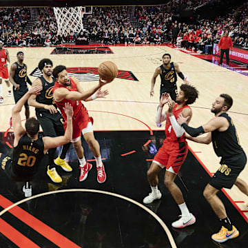 Nov 15, 2023; Portland, Oregon, USA; Portland Trail Blazers guard Skylar Mays (5) drives to the basket during the second half against Cleveland Cavaliers forward Georges Niang (20) at Moda Center. Mandatory Credit: Troy Wayrynen-Imagn Images