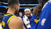 Feb 23, 2024; San Francisco, California, USA; Charlotte Hornets guard Seth Curry (center) talks with Golden State Warriors guard Stephen Curry (left) and forward Draymond Green (right) after the game at Chase Center. Mandatory Credit: Darren Yamashita-Imagn Images