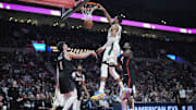Jan 28, 2025; Portland, Oregon, USA; Milwaukee Bucks power forward Giannis Antetokounmpo (34) dunks the ball as Portland Trail Blazers small forward Deni Avdija (8), shooting guard Shaedon Sharpe (17), and center Deandre Ayton (2) look on during the second half at Moda Center. Mandatory Credit: Soobum Im-Imagn Images