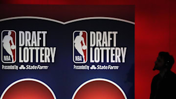 May 12, 2025; Chicago, Illinois, US; A person watches the 2025 NBA Draft Lottery at McCormick Place. Mandatory Credit: David Banks-Imagn Images