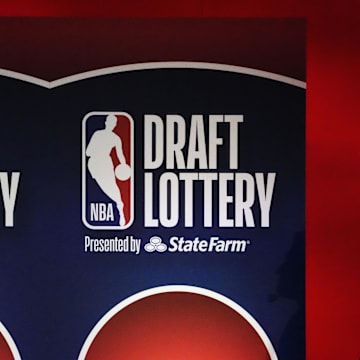 May 12, 2025; Chicago, Illinois, US; A person watches the 2025 NBA Draft Lottery at McCormick Place. Mandatory Credit: David Banks-Imagn Images