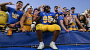 Sep 14, 2024; Pittsburgh, Pennsylvania, USA; Pittsburgh Panthers defensive lineman Francis Brewu (95) celebrates after defeating the West Virginia Mountaineers at Acrisure Stadium. Mandatory Credit: Barry Reeger-Image Images