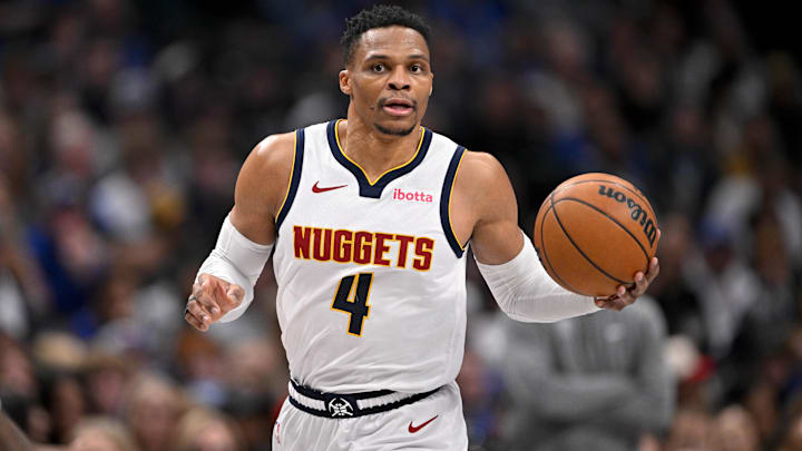 Jan 12, 2025; Dallas, Texas, USA; Denver Nuggets guard Russell Westbrook (4) brings the ball up court against the Dallas Mavericks during the second half at the American Airlines Center. Mandatory Credit: Jerome Miron-Imagn Images Jan 12, 2025; Dallas, Texas, USA; Denver Nuggets guard Russell Westbrook (4) brings the ball up court against the Dallas Mavericks during the second half at the American Airlines Center. Mandatory Credit: Jerome Miron-Imagn Images