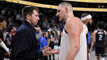 Jan 12, 2025; Dallas, Texas, USA; Dallas Mavericks guard Luka Doncic (left) talks with Denver Nuggets center Nikola Jokic (right) after the game at the American Airlines Center. Mandatory Credit: Jerome Miron-Imagn Images