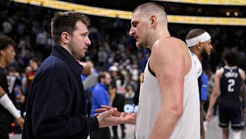 Jan 12, 2025; Dallas, Texas, USA; Dallas Mavericks guard Luka Doncic (left) talks with Denver Nuggets center Nikola Jokic (right) after the game at the American Airlines Center. Mandatory Credit: Jerome Miron-Imagn Images