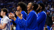 Nov 21, 2025; Lexington, Kentucky, USA; Kentucky Wildcats guard Jaland Lowe celebrates from the bench during the first half against the Loyola (MD) Greyhounds at Rupp Arena at Central Bank Center. Mandatory Credit: Jordan Prather-Imagn Images