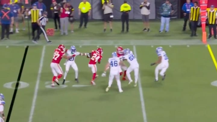 Travis Kelce appeared to get away with holding on this run. 