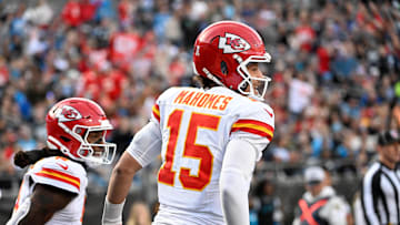 Nov 24, 2024; Charlotte, North Carolina, USA; Kansas City Chiefs wide receiver DeAndre Hopkins (8) celebrates with quarterback Patrick Mahomes (15) after scoring a touchdown in the third quarter at Bank of America Stadium. Mandatory Credit: Bob Donnan-Imagn Images