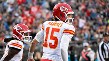 Nov 24, 2024; Charlotte, North Carolina, USA; Kansas City Chiefs wide receiver DeAndre Hopkins (8) celebrates with quarterback Patrick Mahomes (15) after scoring a touchdown in the third quarter at Bank of America Stadium.