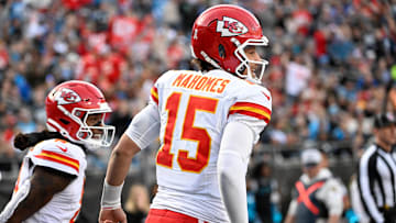 Nov 24, 2024; Charlotte, North Carolina, USA; Kansas City Chiefs wide receiver DeAndre Hopkins (8) celebrates with quarterback Patrick Mahomes (15) after scoring a touchdown in the third quarter at Bank of America Stadium. Mandatory Credit: Bob Donnan-Imagn Images