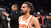Apr 11, 2025; Philadelphia, Pennsylvania, USA; Atlanta Hawks guard Trae Young (11) looks on after the game against the Philadelphia 76ers at Wells Fargo Center. Mandatory Credit: Kyle Ross-Imagn Images