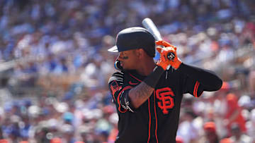 Mar 1, 2025; Phoenix, Arizona, USA; San Francisco Giants second baseman Sergio Alcantara (50) bats against the Los Angeles Dodgers during the second inning at Camelback Ranch-Glendale. Mandatory Credit: Joe Camporeale-Imagn Images