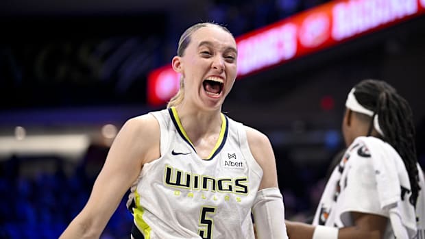 Dallas Wings guard Paige Bueckers celebrates after the game against the Phoenix Mercury