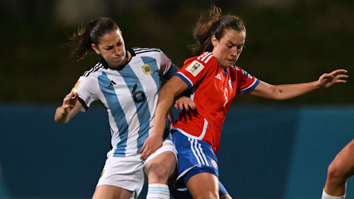Aldana Ometti (L) of Argentina Women's National soccer team...