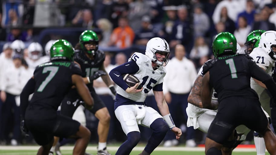 Penn State Nittany Lions quarterback Drew Allar (15) runs for a gain