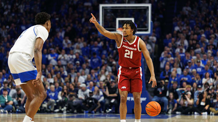 Feb 1, 2025; Lexington, Kentucky, USA; Arkansas Razorbacks guard D.J. Wagner (21) brings the ball up court during the first half against the Kentucky Wildcats at Rupp Arena at Central Bank Center. Mandatory Credit: Jordan Prather-Imagn Images