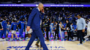 Dec 2, 2025; Lexington, Kentucky, USA; Kentucky Wildcats head coach Mark Pope walks off the court after the game against the North Carolina Tar Heels at Rupp Arena at Central Bank Center. Mandatory Credit: Jordan Prather-Imagn Images