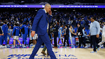 Dec 2, 2025; Lexington, Kentucky, USA; Kentucky Wildcats head coach Mark Pope walks off the court after the game against the North Carolina Tar Heels at Rupp Arena at Central Bank Center. Mandatory Credit: Jordan Prather-Imagn Images