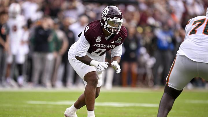 Dec 20, 2025; College Station, TX, USA; Texas A&M Aggies defensive end Cashius Howell (9) lines up during the game between the Aggies and the Hurricanes at Kyle Field. Mandatory Credit: Jerome Miron-Imagn Images
