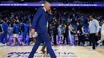 Dec 2, 2025; Lexington, Kentucky, USA; Kentucky Wildcats head coach Mark Pope walks off the court after the game against the North Carolina Tar Heels at Rupp Arena at Central Bank Center. Mandatory Credit: Jordan Prather-Imagn Images