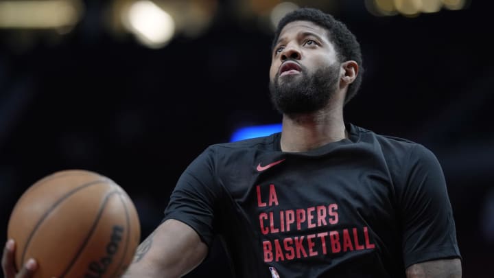 Mar 22, 2024; Portland, Oregon, USA; LA Clippers forward Paul George (13) warms up prior to a game against the Portland Trail Blazers at Moda Center. Mandatory Credit: Soobum Im-USA TODAY Sports