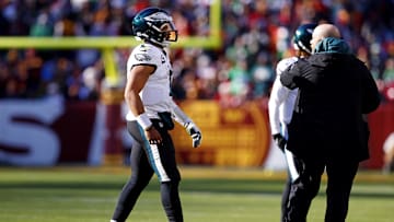 Dec 22, 2024; Landover, Maryland, USA; Philadelphia Eagles quarterback Jalen Hurts (1) walks off the field to leave the game during the first quarter against the Washington Commanders at Northwest Stadium.