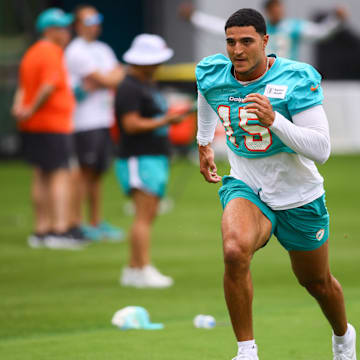 Miami Dolphins linebacker Jaelan Phillips (15) works out during training camp at Baptist Health Training Complex.