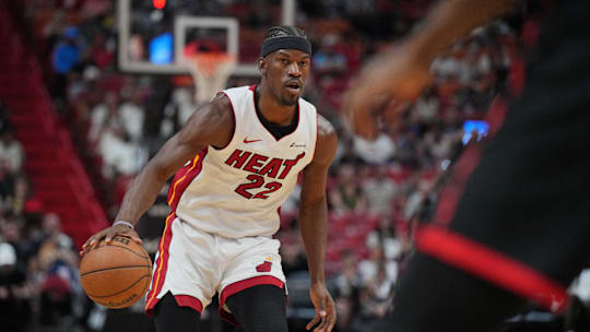 Apr 14, 2024; Miami, Florida, USA;  Miami Heat forward Jimmy Butler (22) brings the ball up the court against the Toronto Raptors during the first half at Kaseya Center. Mandatory Credit: Jim Rassol-USA TODAY Sports