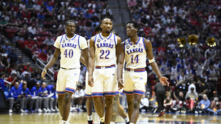 Mar 22, 2026; San Diego, CA, USA; Kansas Jayhawks forward Flory Bidunga (40) and guard Darryn Peterson (22) and guard Melvin Council Jr. (14) look on in the first half against the St. John's Red Storm during a second round game of the men's 2026 NCAA Tournament at Viejas Arena. Mandatory Credit: Denis Poroy-Imagn Images