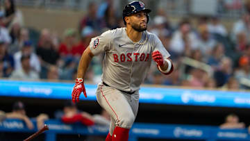 Boston Red Sox first baseman Abraham Toro (29) hits into a ground-rule double during the fifth inning against the Minnesota Twins at Target Field.