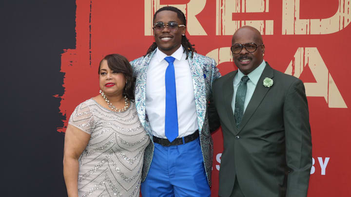 Kentucky Wildcats cornerback Maxwell Hairston with his parents Robin Hairston and Marvin Hairston.
