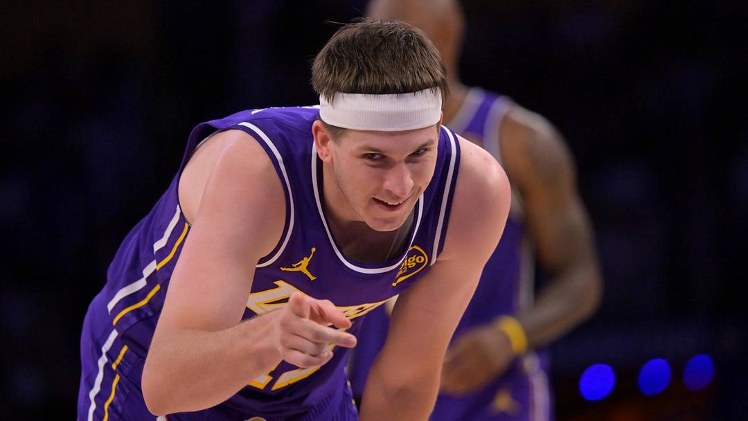 Feb 5, 2026; Los Angeles, California, USA;  Los Angeles Lakers guard Austin Reaves (15) reacts after a foul in the second half against the Philadelphia 76ers at Crypto.com Arena. Mandatory Credit: Jayne Kamin-Oncea-Imagn Images