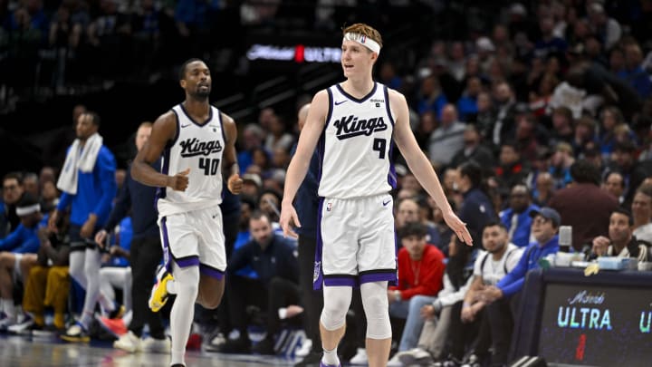Jan 27, 2024; Dallas, Texas, USA; Sacramento Kings forward Harrison Barnes (40) and guard Kevin Huerter (9) celebrate during the second half at the American Airlines Center. Mandatory Credit: Jerome Miron-USA TODAY Sports