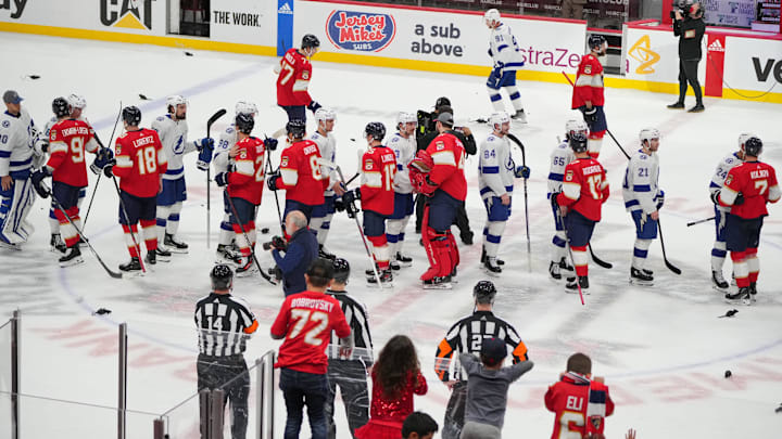 Apr 29, 2024; Sunrise, Florida, USA; Tampa Bay Lightning and Florida Panthers shake hands following game five of the first round of the 2024 Stanley Cup Playoffs at Amerant Bank Arena. The Panther won the series 4-1 and advance to the second round. Mandatory Credit: Jim Rassol-Imagn Images