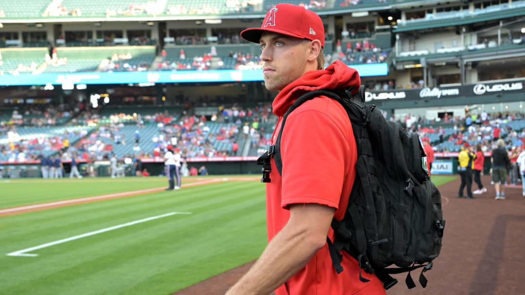 Jun 19, 2024; Anaheim, California, USA;  Los Angeles Angels relief pitcher Ben Joyce (44) walk on the field prior to the game against the Milwaukee Brewers at Angel Stadium. Mandatory Credit: Jayne Kamin-Oncea-USA TODAY Sports