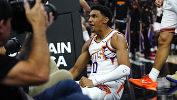 Suns forward Ryan Dunn (0) reacts after making a layup and drawing a foul on Clippers forward Brook Lopez (11) during a game at the Mortgage Matchup Center on Nov. 6, 2025.