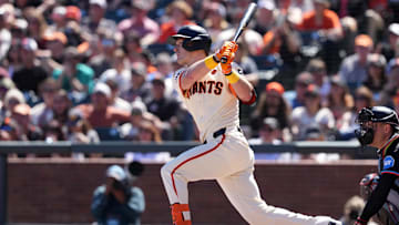 Sep 1, 2024; San Francisco, California, USA; San Francisco Giants pinch hitter Mark Canha (16) hits an RBI single against the Miami Marlins during the fifth inning at Oracle Park. 