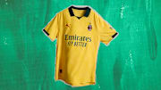 AC Milan's new third kit is yellow and green.