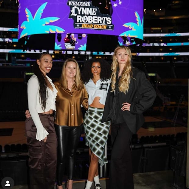 Dearica Hamby (left), coach Lynne Roberts, Rae Burrell, Cameron Brink
