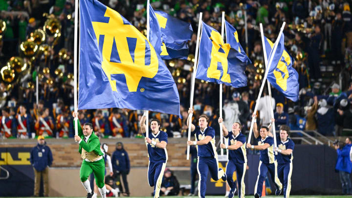 Oct 14, 2023; South Bend, Indiana, USA; The Notre Dame Leprechaun and cheerleaders celebrate after a Notre Dame touchdown in the third quarter against the USC Trojans at Notre Dame Stadium. Mandatory Credit: Matt Cashore-USA TODAY Sports