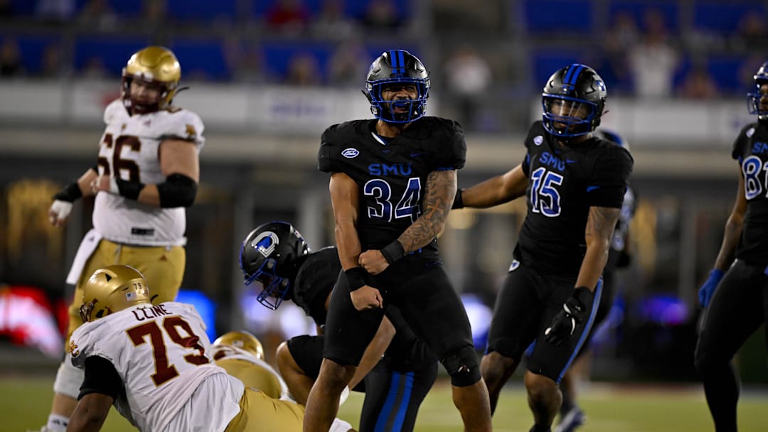 Nov 16, 2024; Dallas, Texas, USA; SMU Mustangs linebacker Ahmad Walker (34) celebrates during the game between the SMU Mustangs and the Boston College Eagles at Gerald J. Ford Stadium. Mandatory Credit: Jerome Miron-Imagn Images