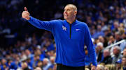 Oct 30, 2025; Lexington, KY, USA; Kentucky Wildcats head coach Mark Pope calls out to his players during the first half against the Georgetown Hoyas at Rupp Arena at Central Bank Center. Mandatory Credit: Jordan Prather-Imagn Images