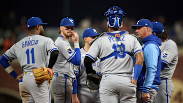 May 20, 2025; San Francisco, California, USA; Kansas City Royals manager Matt Quatraro (33) meets his team on the mound for a pitching change against the San Francisco Giants during the sixth inning at Oracle Park. Mandatory Credit: Robert Edwards-Imagn Images
